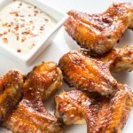 Baked chicken wings with spicy sauce